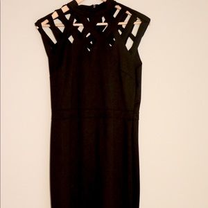 Black mini dress with cut out collar.